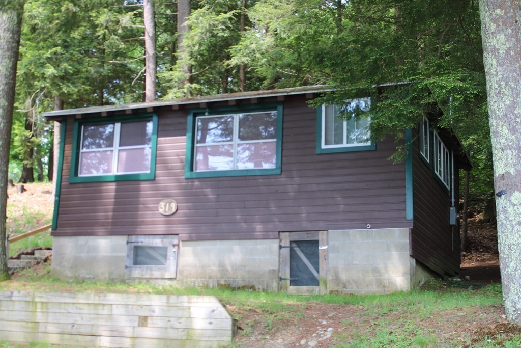 319 Wendell Road Warwick, MA 01378 - Photo 1 of 16 a front view of a house with garden