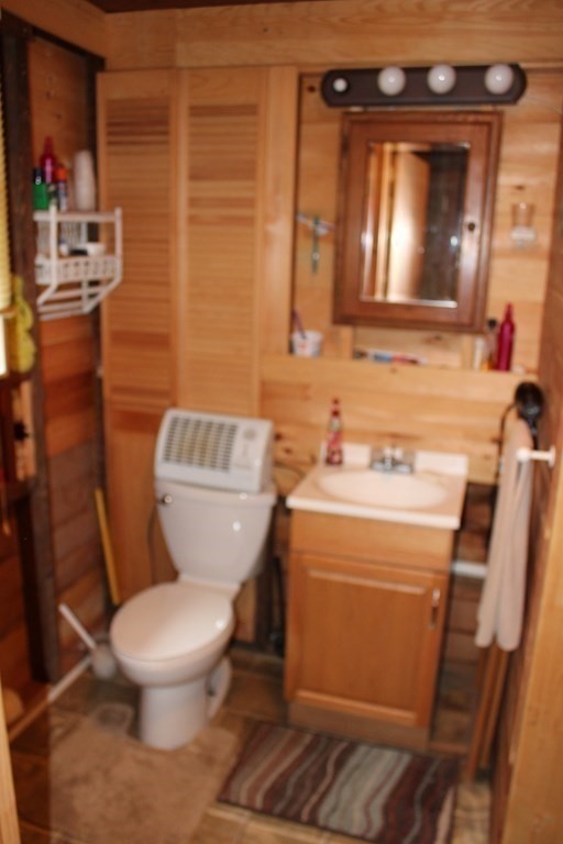 319 Wendell Road Warwick, MA 01378 - Photo 12 of 16 a bathroom with a toilet a sink and a mirror