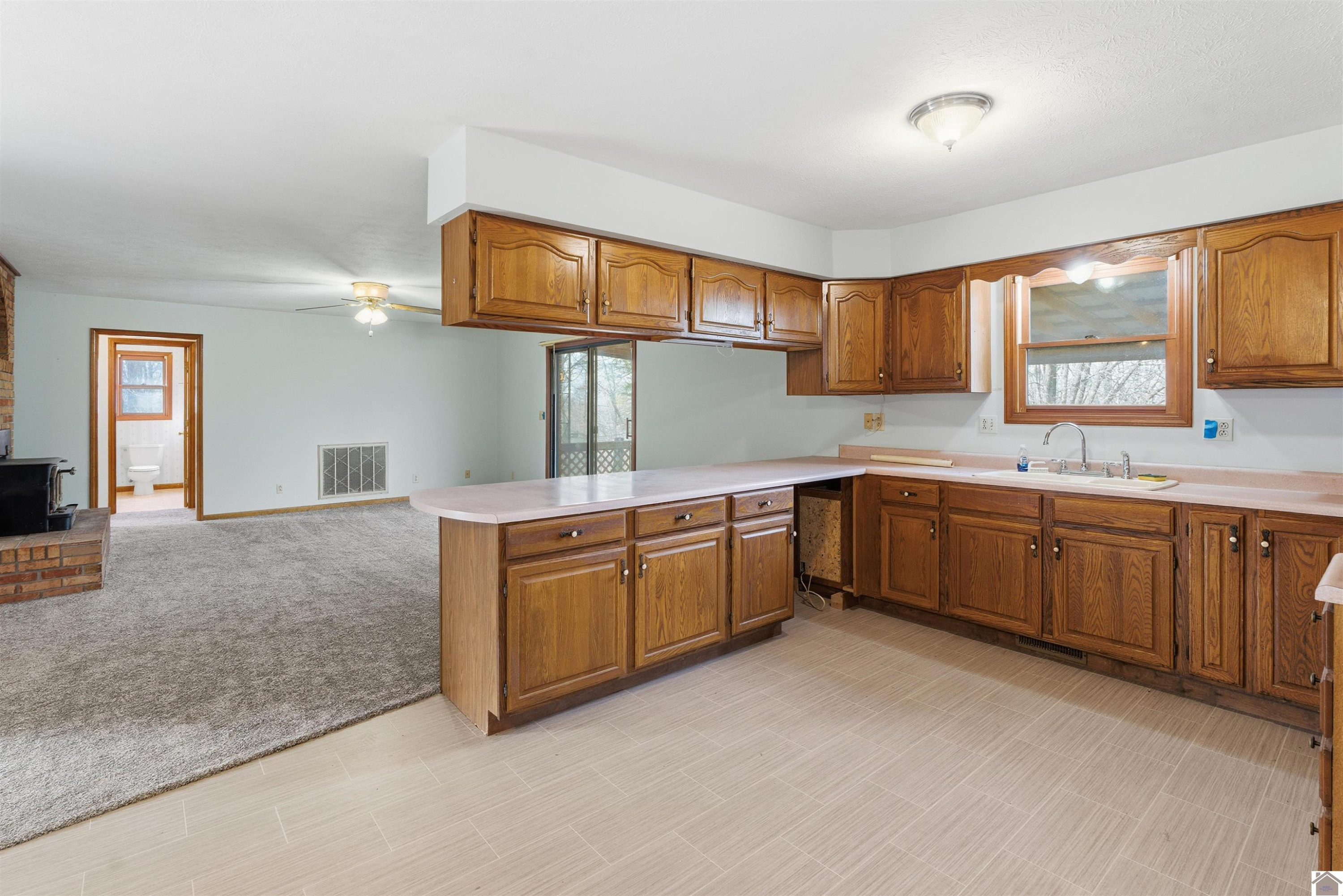 915 Jake Dukes Road Grand Rivers, KY 42045 - Photo 10 of 49 Kitchen Open to Livingroom