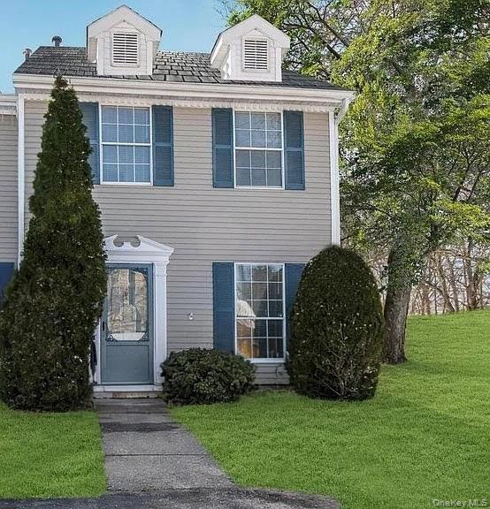 a view of a house with a garden