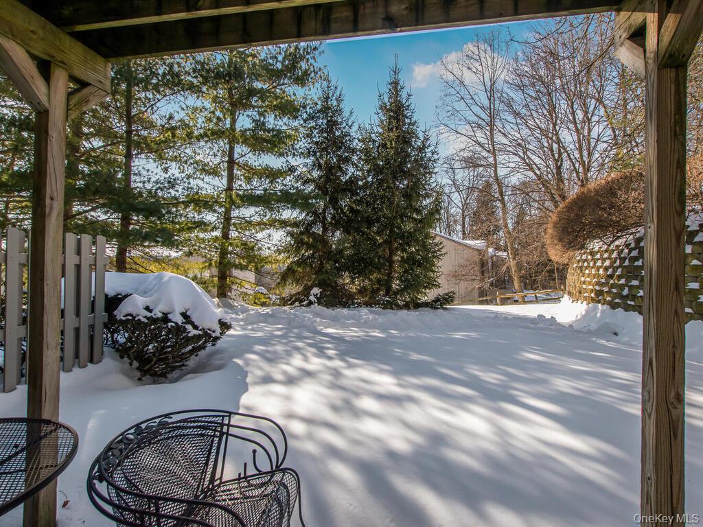 31 Winchester Avenue Peekskill, NY 10566 - Photo 13 of 33 a table and chairs in a patio