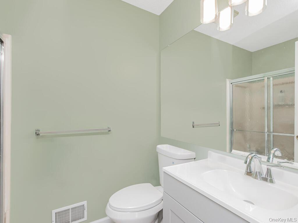 31 Winchester Avenue Peekskill, NY 10566 - Photo 16 of 33 a bathroom with a sink a toilet and shower