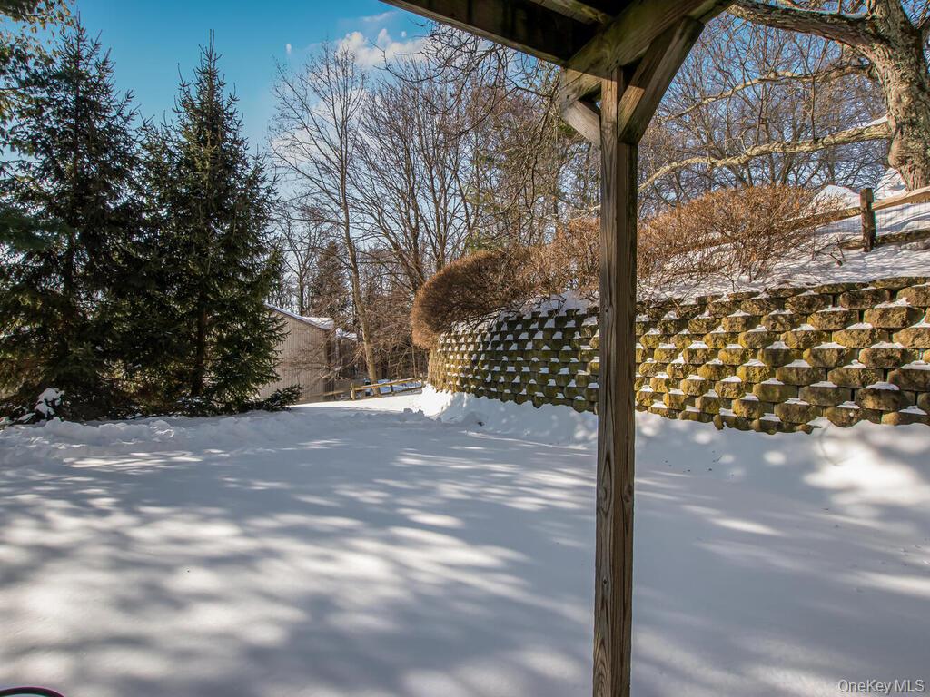 31 Winchester Avenue Peekskill, NY 10566 - Photo 22 of 33 a view of a yard with wooden fence