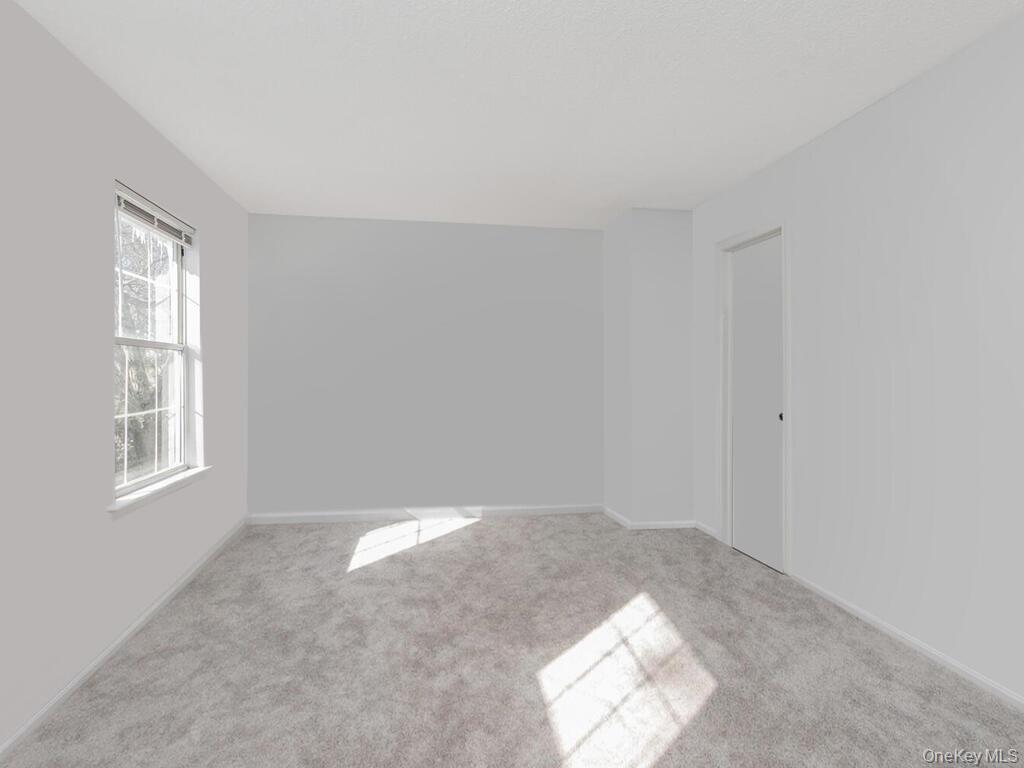 31 Winchester Avenue Peekskill, NY 10566 - Photo 27 of 33 an empty room with windows