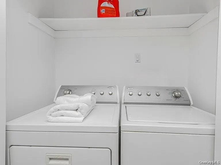 31 Winchester Avenue Peekskill, NY 10566 - Photo 29 of 33 a utility room with dryer and washer