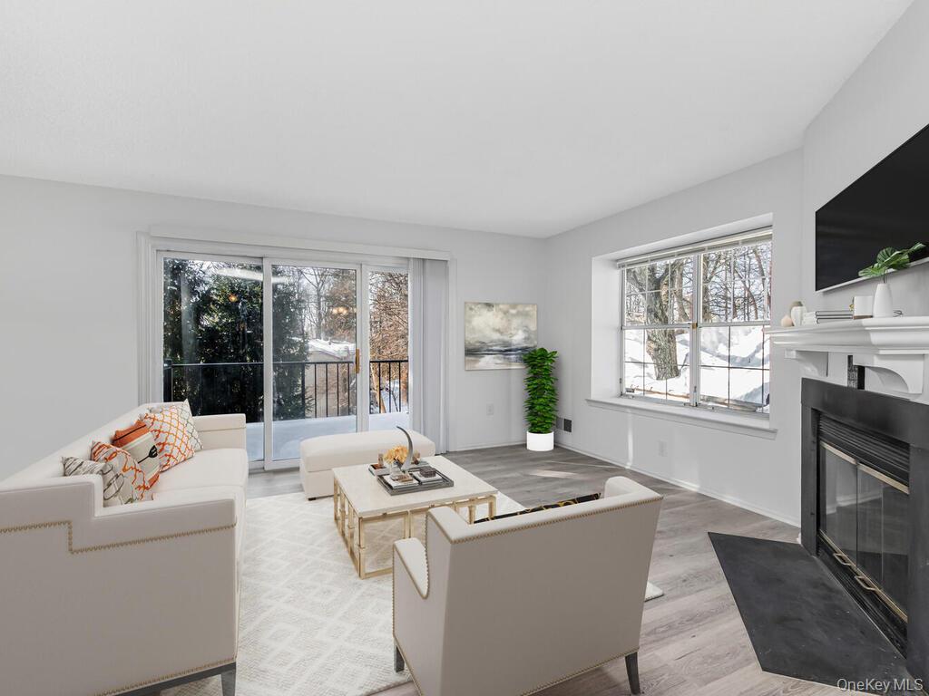 31 Winchester Avenue Peekskill, NY 10566 - Photo 7 of 33 a living room with furniture and a flat screen tv