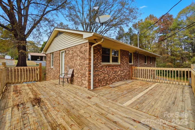 a view of backyard with green space