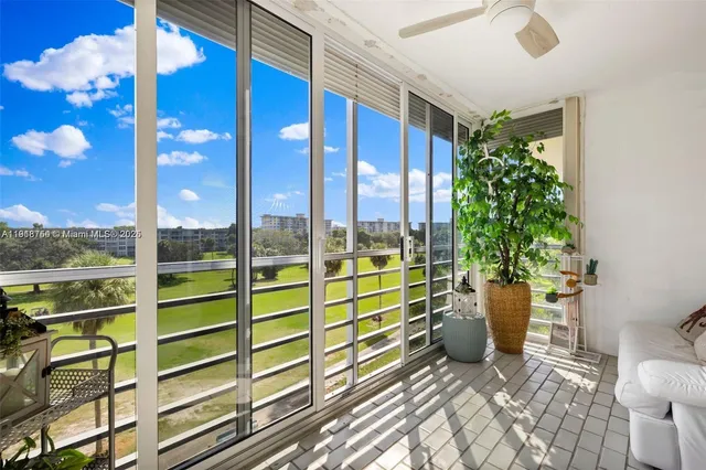 a view of a room with a window