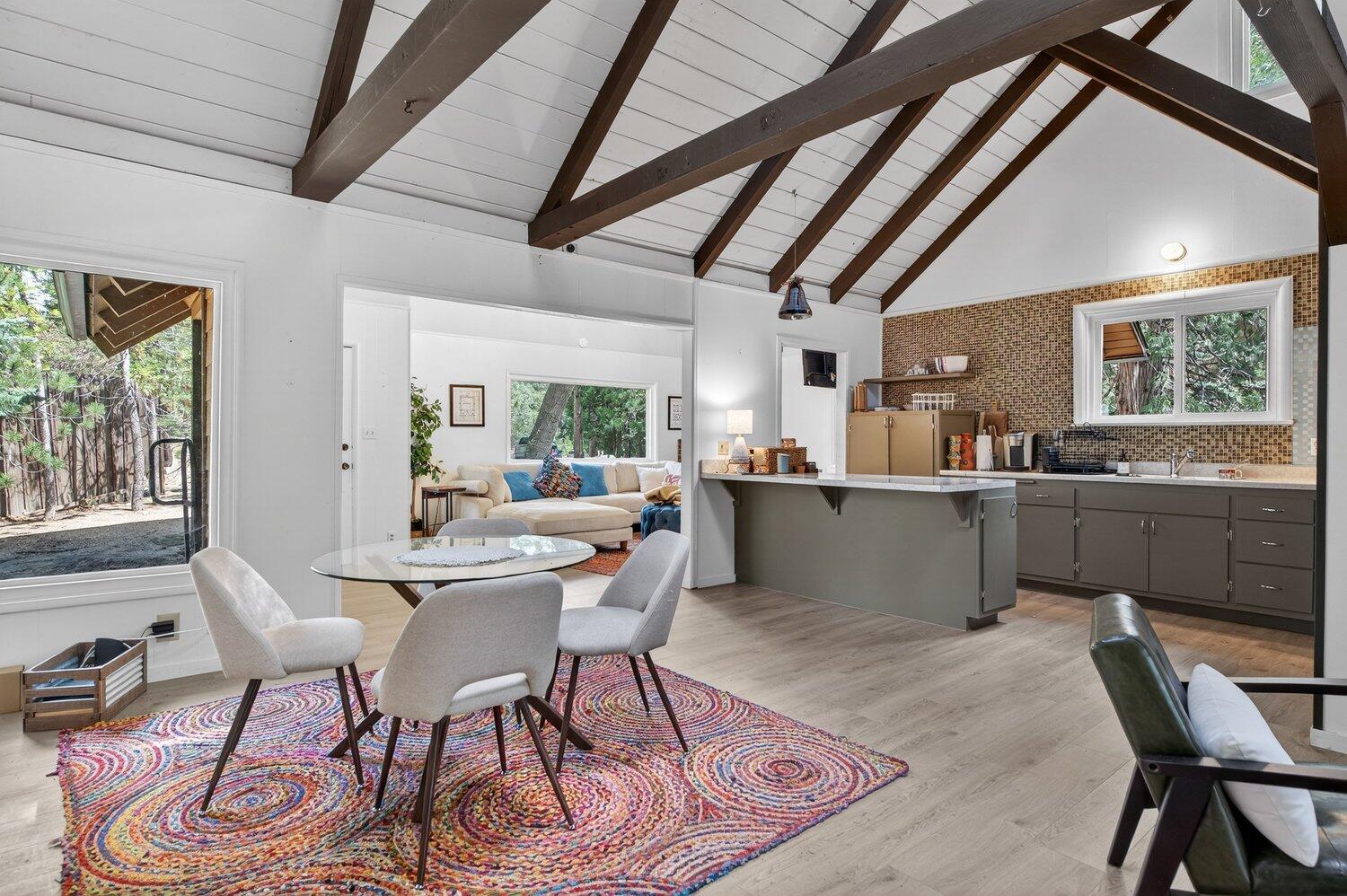 52230 Sylvan Way Idyllwild, CA 92549 - Photo 13 of 35 a dining room with furniture and window