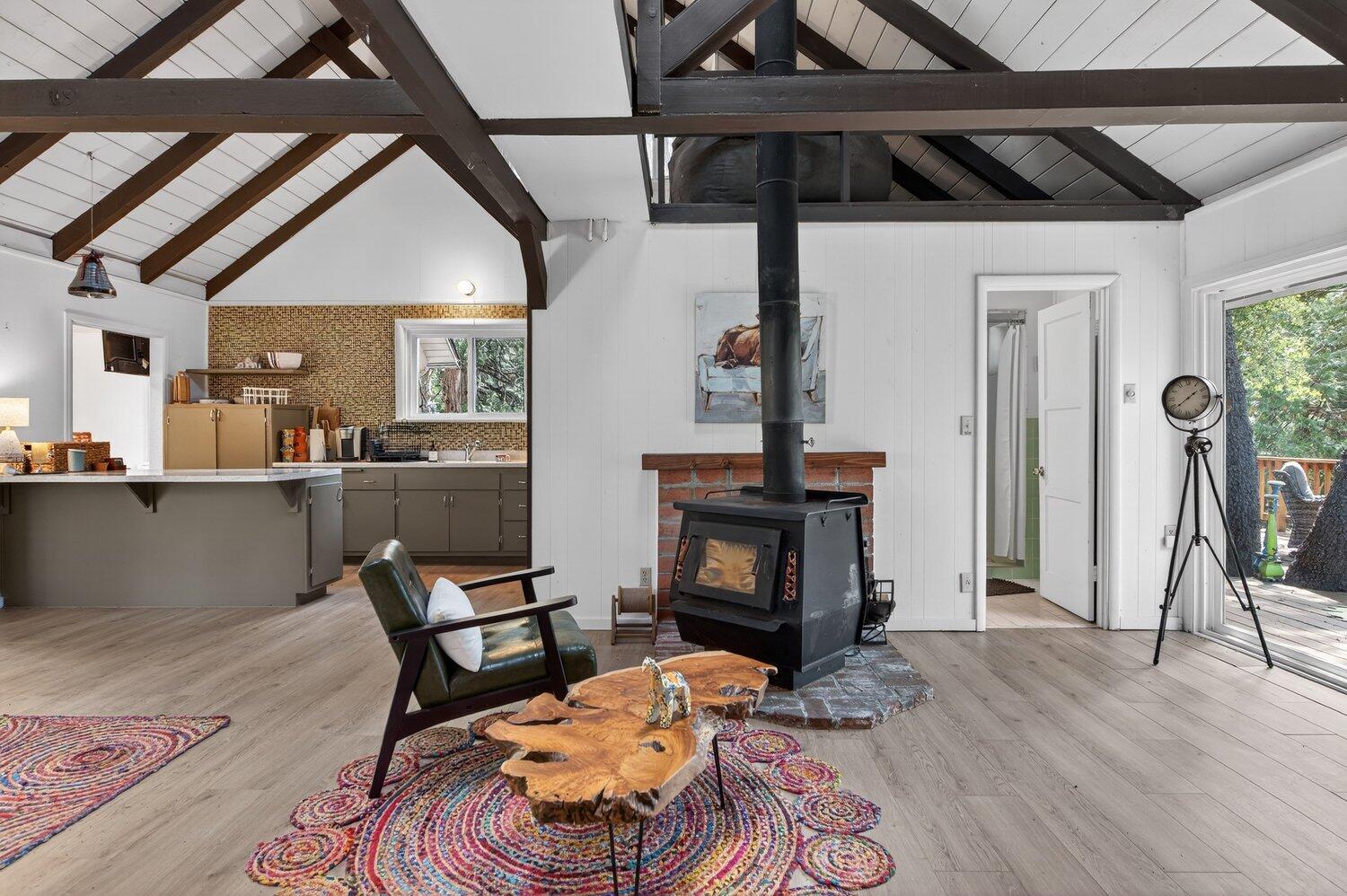 52230 Sylvan Way Idyllwild, CA 92549 - Photo 14 of 35 a living room with furniture and a fireplace