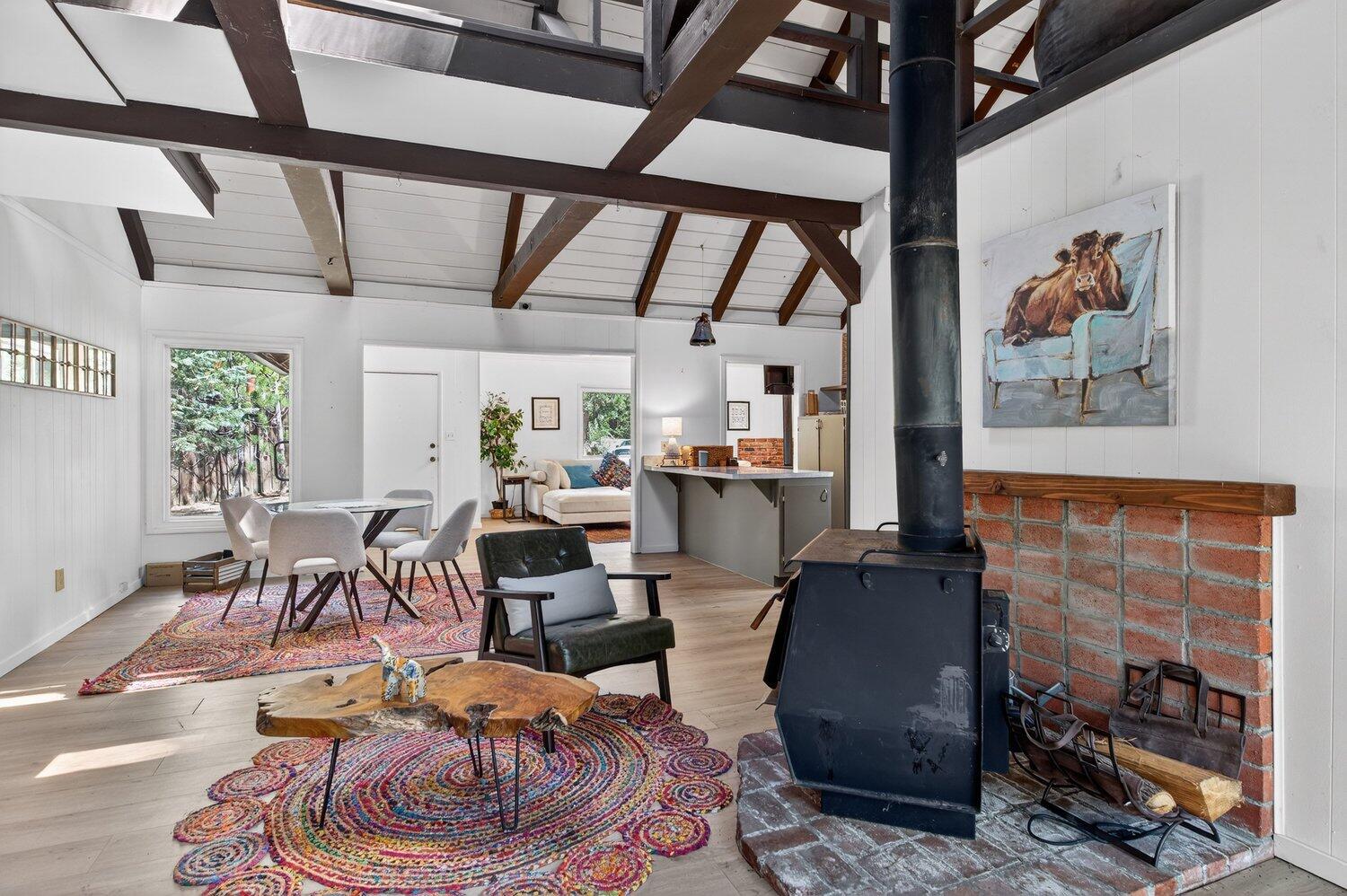 52230 Sylvan Way Idyllwild, CA 92549 - Photo 15 of 35 a living room with furniture and a fireplace