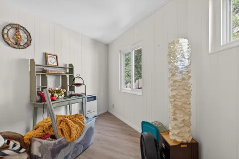 a room with furniture and a window