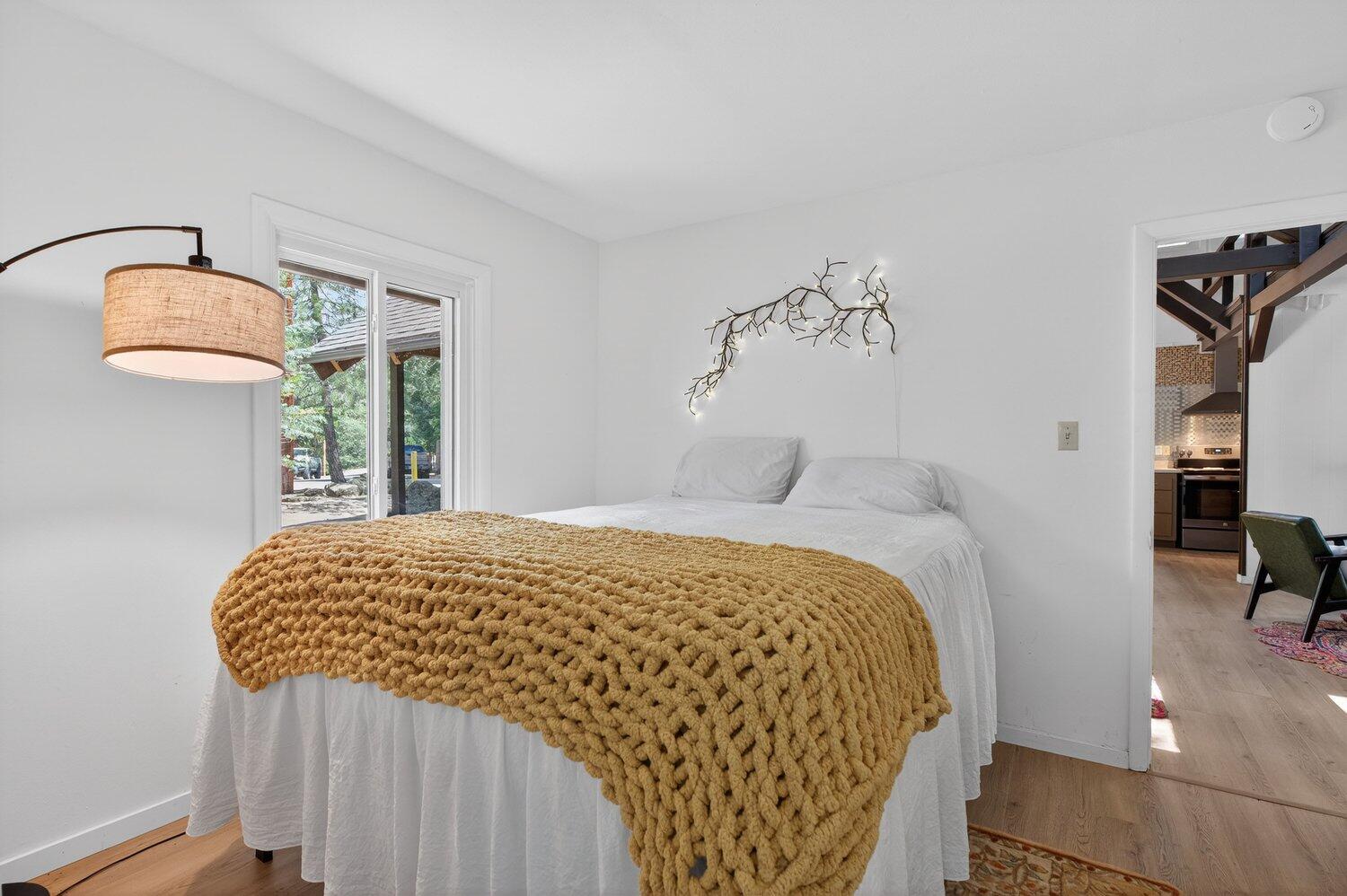 52230 Sylvan Way Idyllwild, CA 92549 - Photo 20 of 35 a bedroom with a bed and a mirror