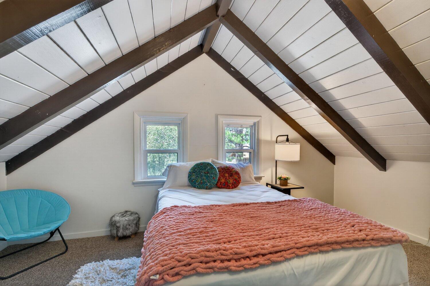 52230 Sylvan Way Idyllwild, CA 92549 - Photo 27 of 35 a bedroom with a bed a window and dresser