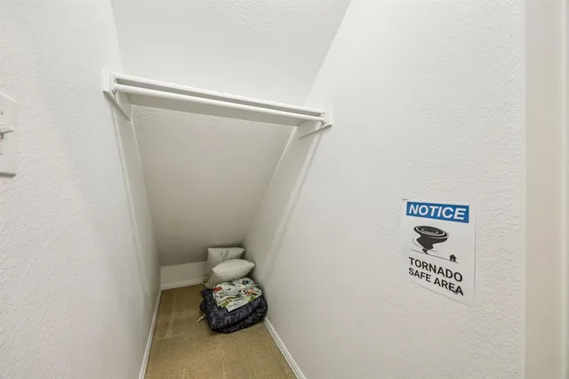 a view of a chairs on the roof deck