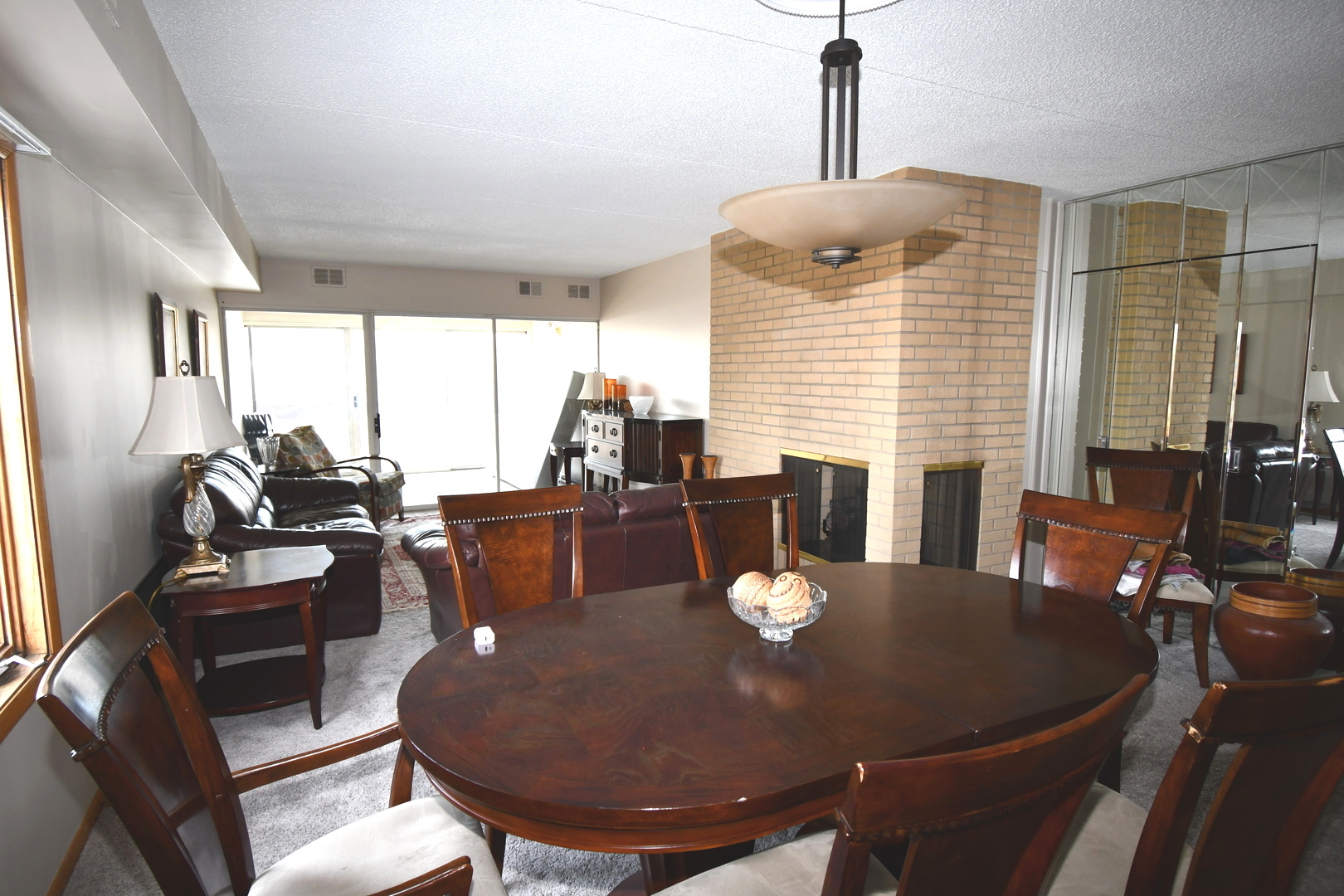 1S095 Spring Road, Unit H2 Oakbrook Terrace, IL 60181 - Photo 20 of 40 a view of a dining room with furniture window and outside view