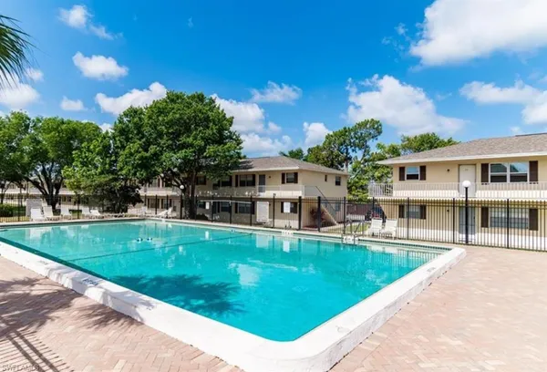 a view of a house with swimming pool