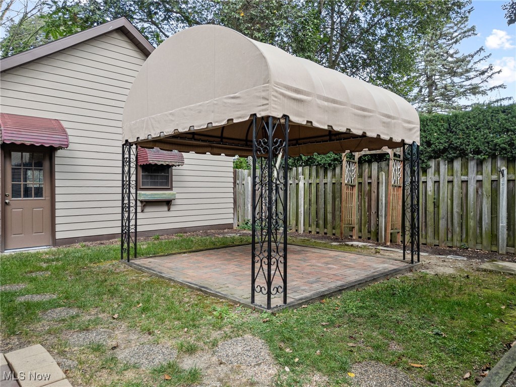 1271 Circle Drive Akron, OH 44310 - Photo 33 of 45 View of patio / terrace with a gazebo & 2 car garage.