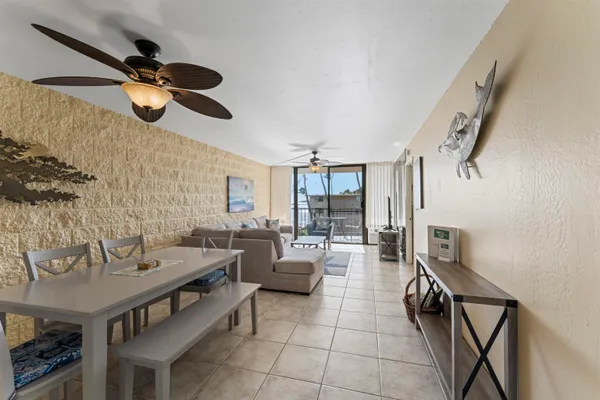 a very nice looking room with a dining table chairs