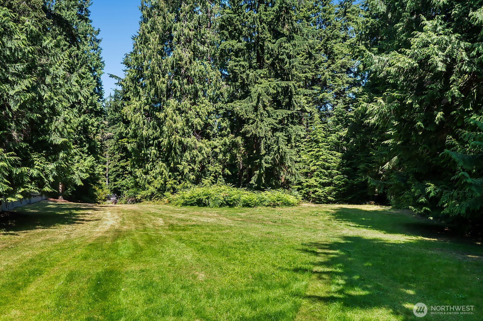 971 Sandy Point Road Langley, WA 98260 - Photo 28 of 35 a view of outdoor space with deck and yard