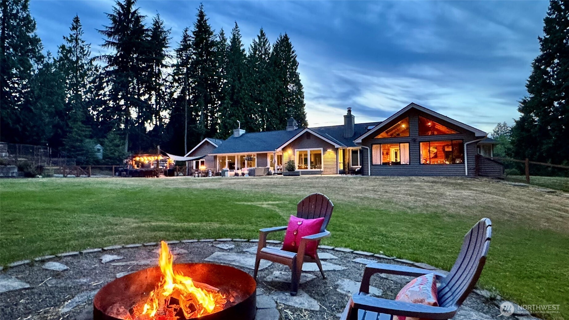 971 Sandy Point Road Langley, WA 98260 - Photo 32 of 35 a view of an house with backyard space and sitting area