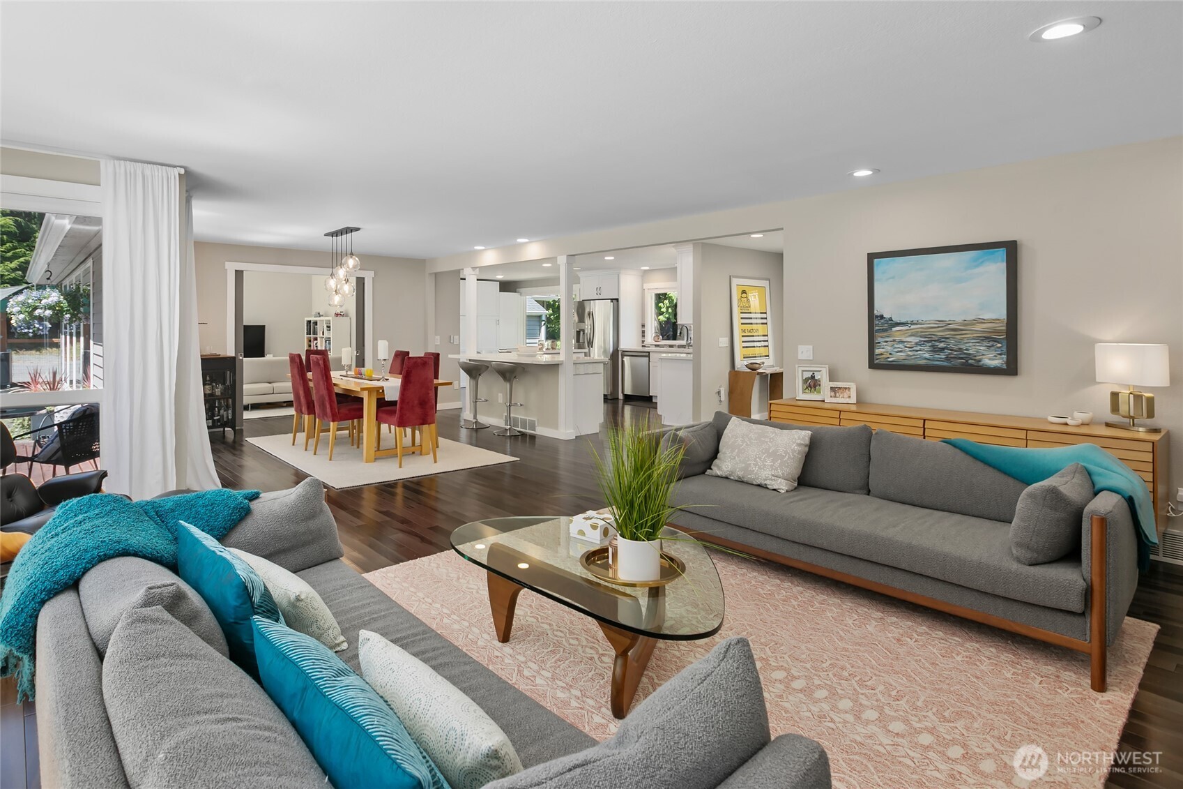 971 Sandy Point Road Langley, WA 98260 - Photo 8 of 35 a living room with furniture or couch and a view of kitchen