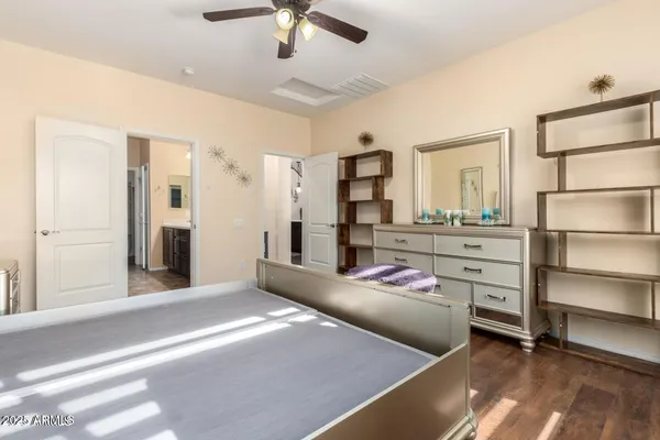 a bedroom with a bed and a cabinets