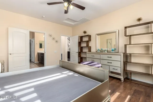 a bedroom with a bed and a cabinets