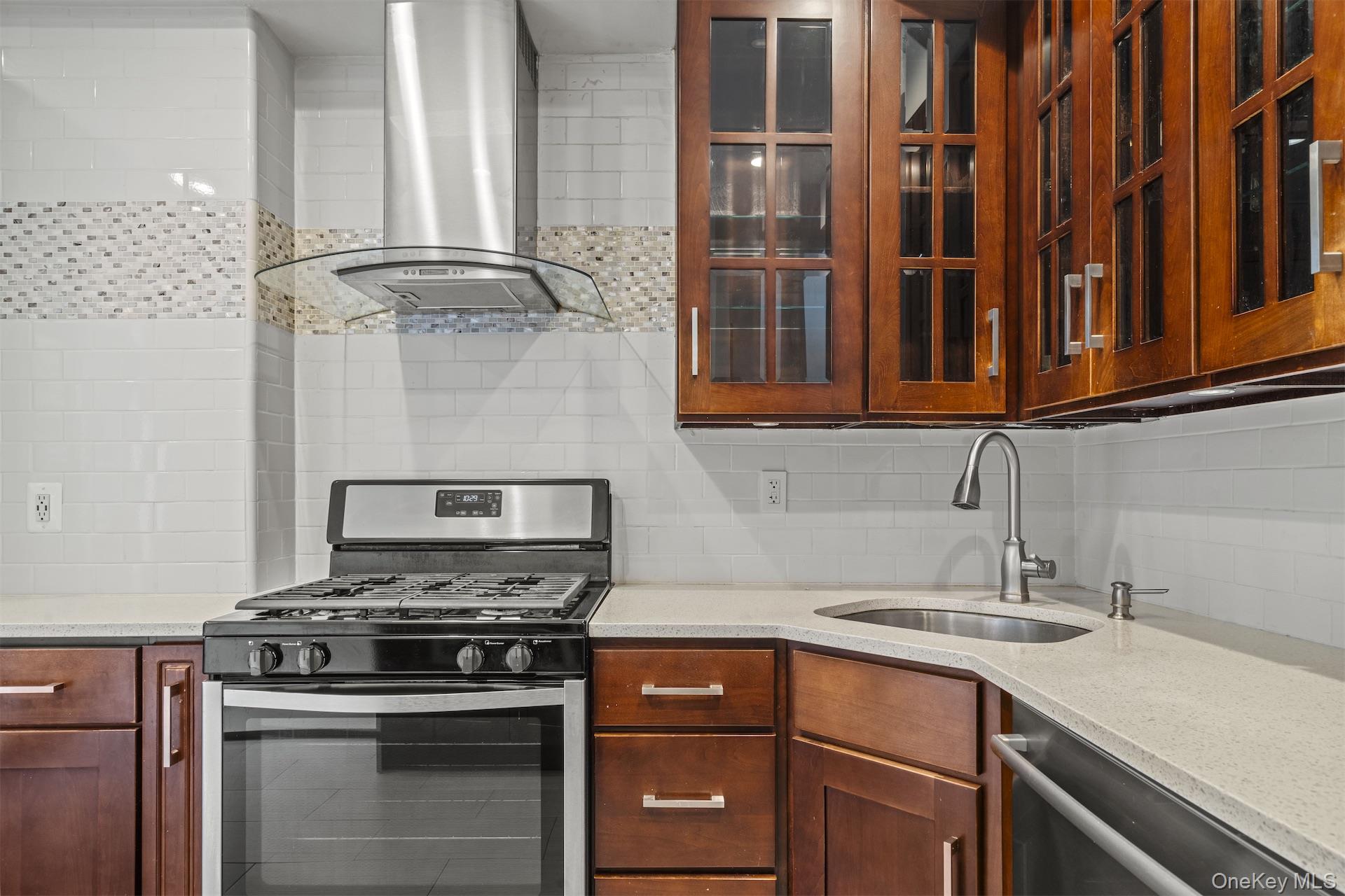 44 Decatur Street, Unit 1 Brooklyn, NY 11216 - Photo 7 of 18 a kitchen with stainless steel appliances granite countertop a sink stove and cabinets
