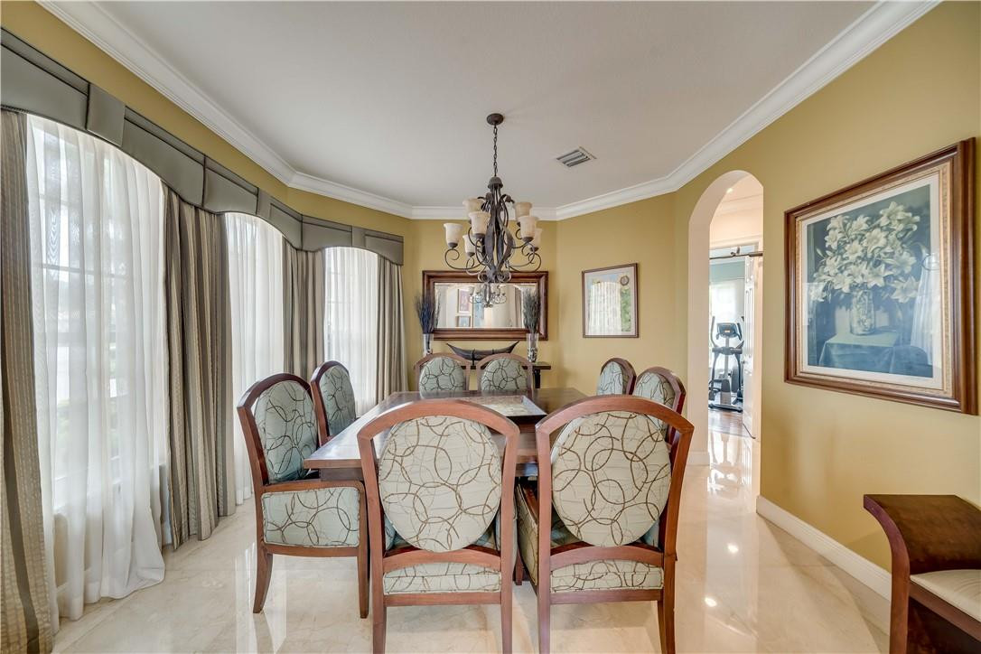 10508 Laurel Road Davie, FL 33328 - Photo 15 of 82 a view of a dining room with furniture window and wooden floor
