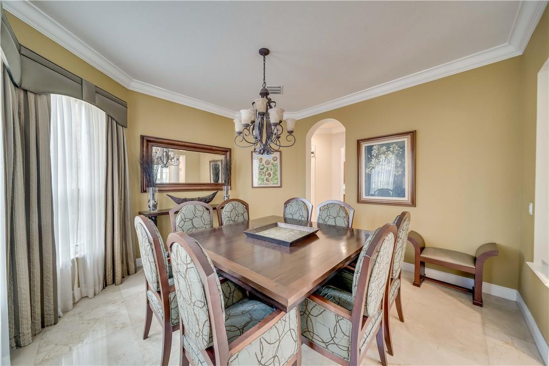 10508 Laurel Road Davie, FL 33328 - Photo 16 of 82 a view of a dining room with furniture and window