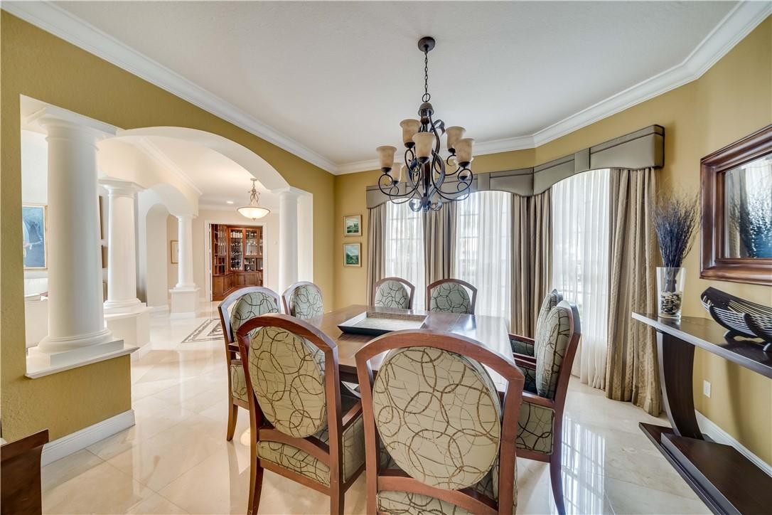 10508 Laurel Road Davie, FL 33328 - Photo 17 of 82 a view of a dining room with furniture window and wooden floor