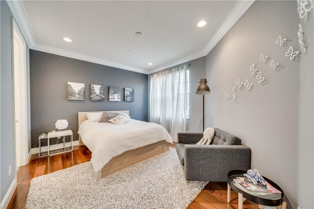 10508 Laurel Road Davie, FL 33328 - Photo 26 of 82 a bedroom with a bed and a couch