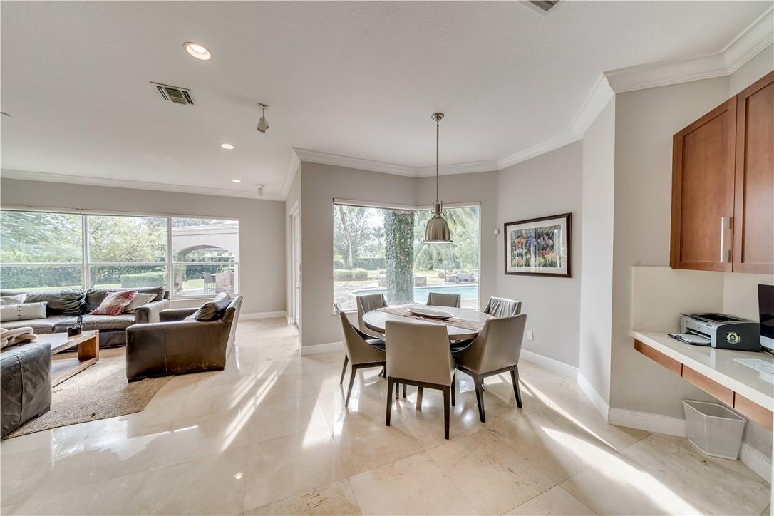 10508 Laurel Road Davie, FL 33328 - Photo 33 of 82 a view of a dining room with furniture window and outside view