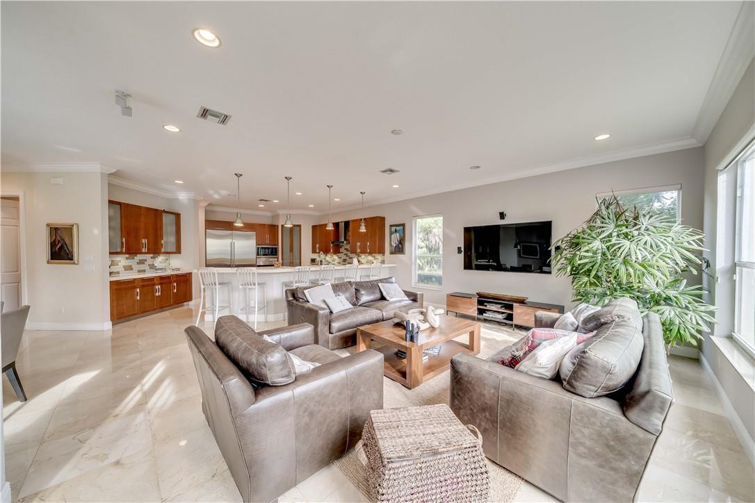 10508 Laurel Road Davie, FL 33328 - Photo 37 of 82 a living room with furniture and a flat screen tv
