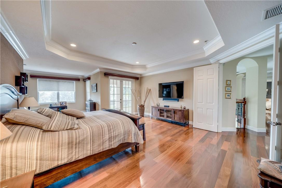 10508 Laurel Road Davie, FL 33328 - Photo 40 of 82 a bedroom with bed and a flat screen tv