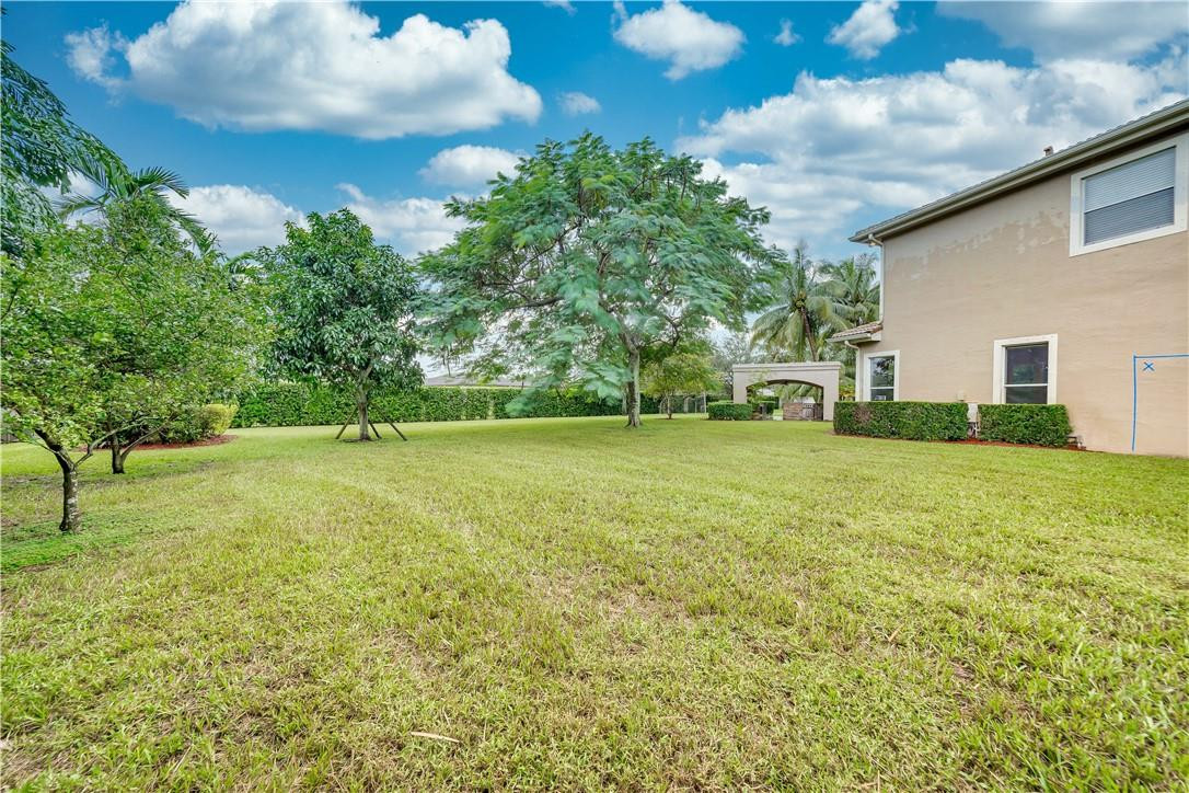 10508 Laurel Road Davie, FL 33328 - Photo 66 of 82 a view of a field of grass and trees