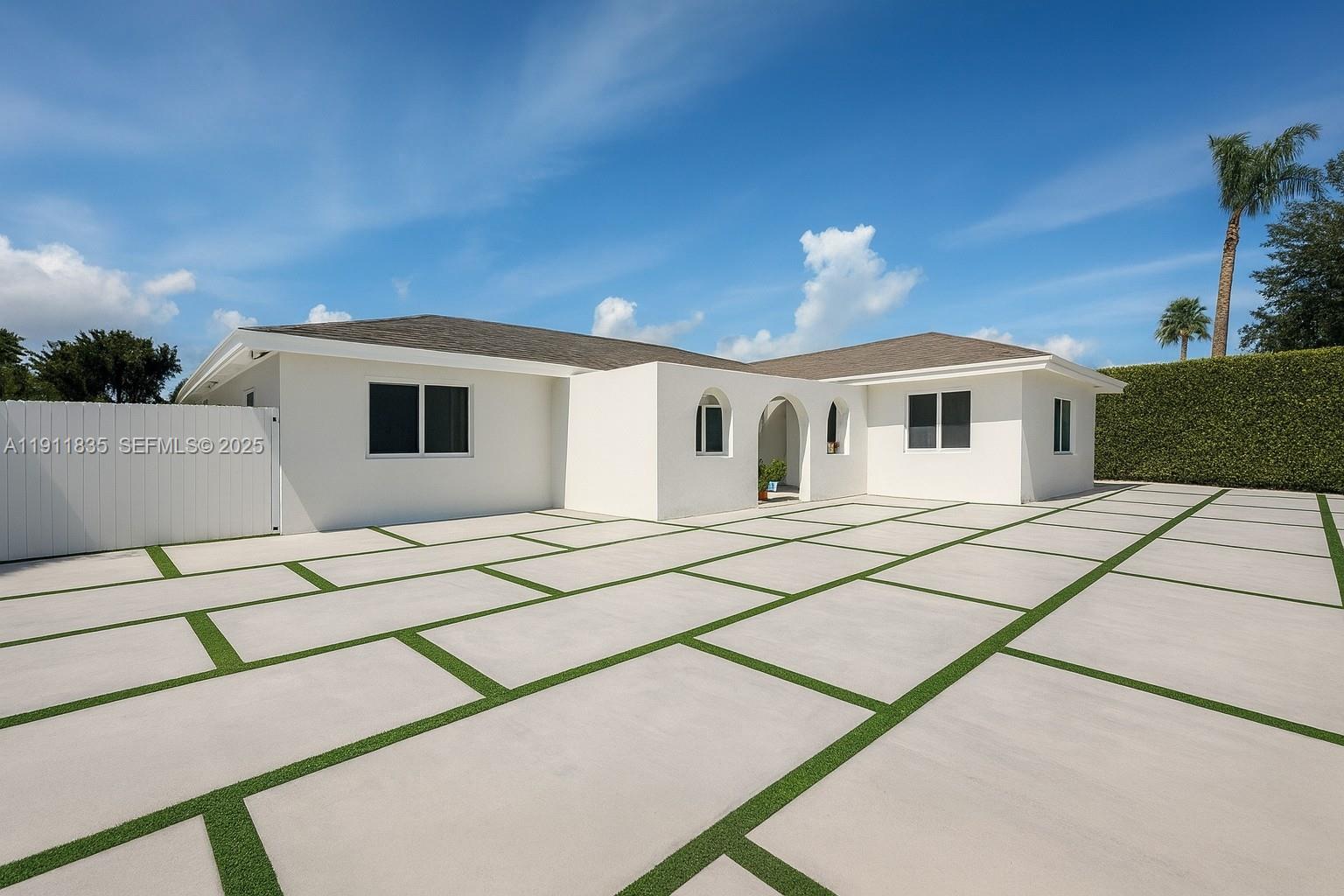 a white building with a outdoor space
