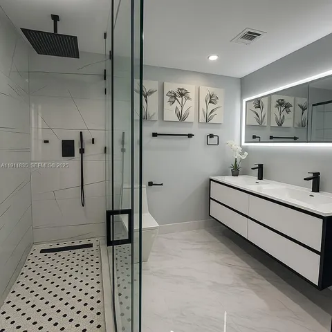 a bathroom with a sink and a shower