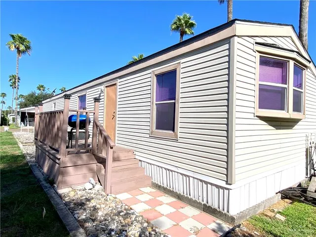 a view of a park with a tree