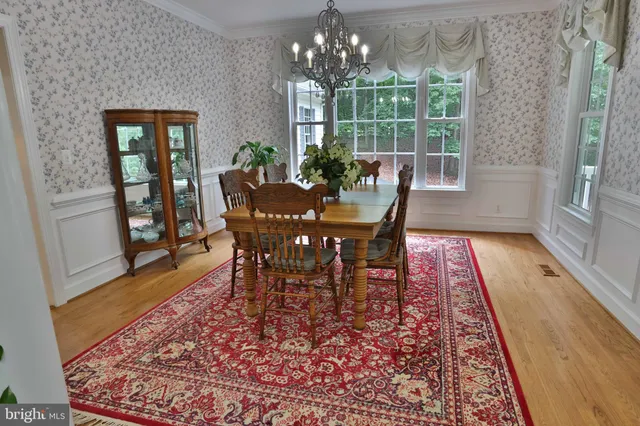 a view of workspace with furniture and window