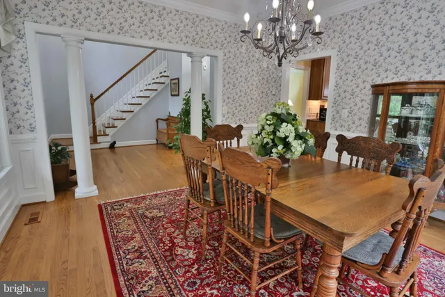 a bedroom with a large bed and a large window