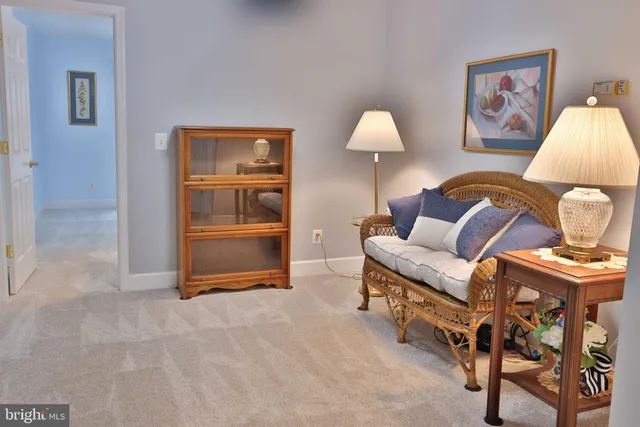 a view of walk in closet with clothes