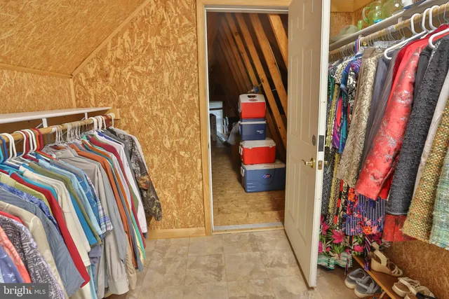 a view of an empty room with stairs