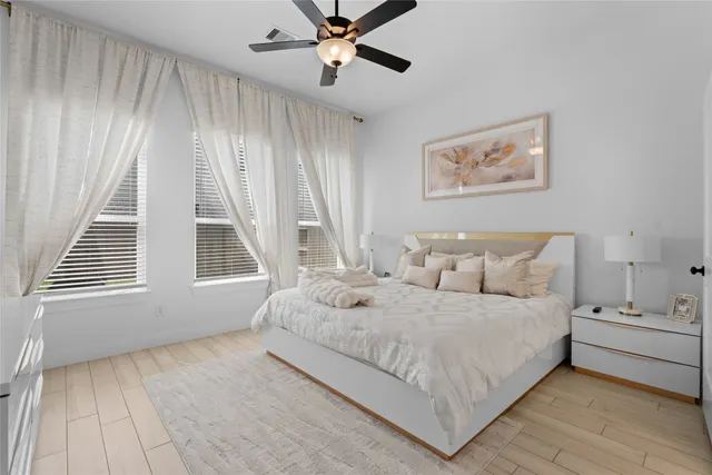 a room with a bed and a window