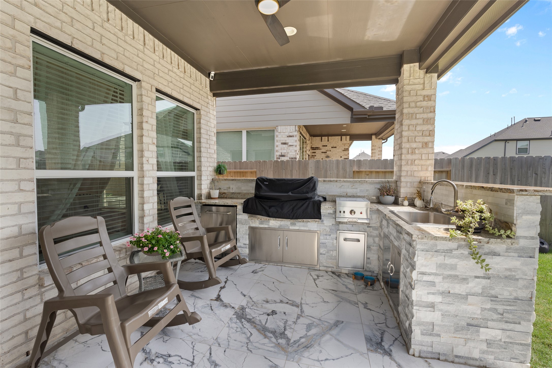 17735 Tree Of Heaven Conroe, TX 77385 - Photo 30 of 35 a view of a chairs and table in the patio