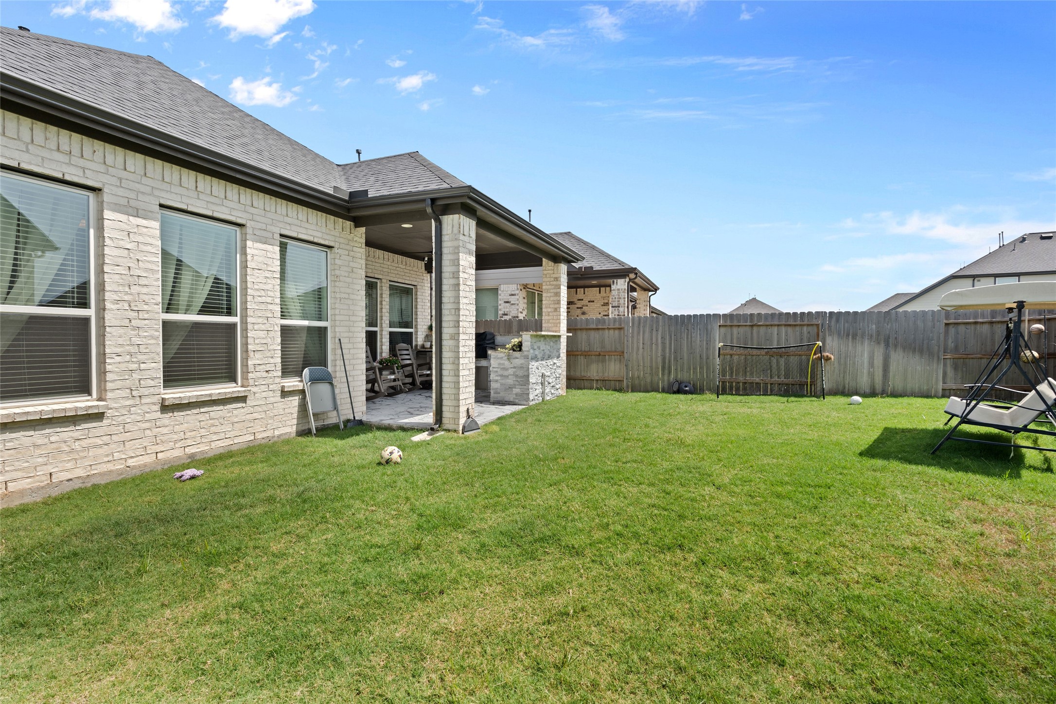 17735 Tree Of Heaven Conroe, TX 77385 - Photo 32 of 35 a view of a house with backyard and porch