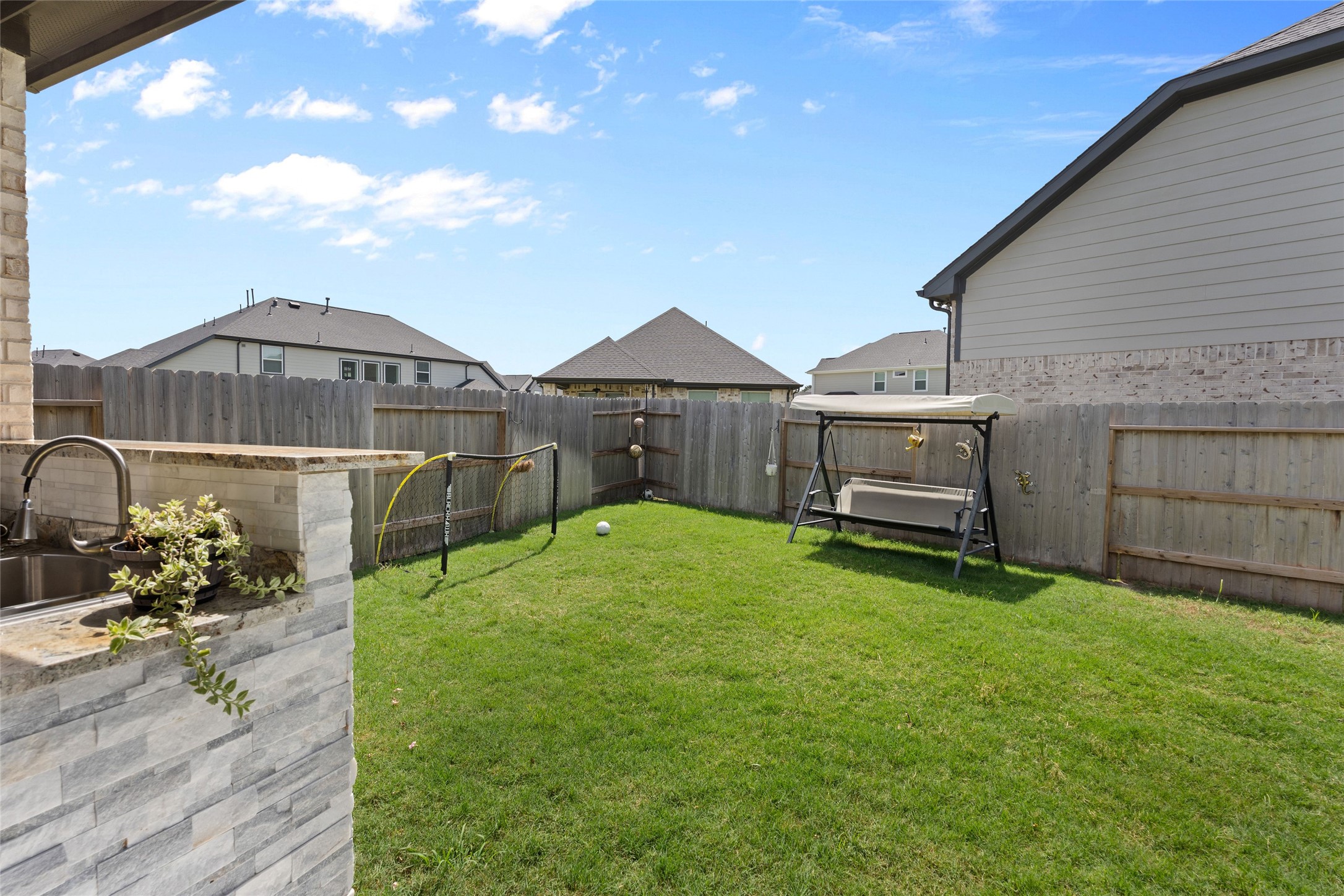 17735 Tree Of Heaven Conroe, TX 77385 - Photo 33 of 35 a view of a house with a backyard