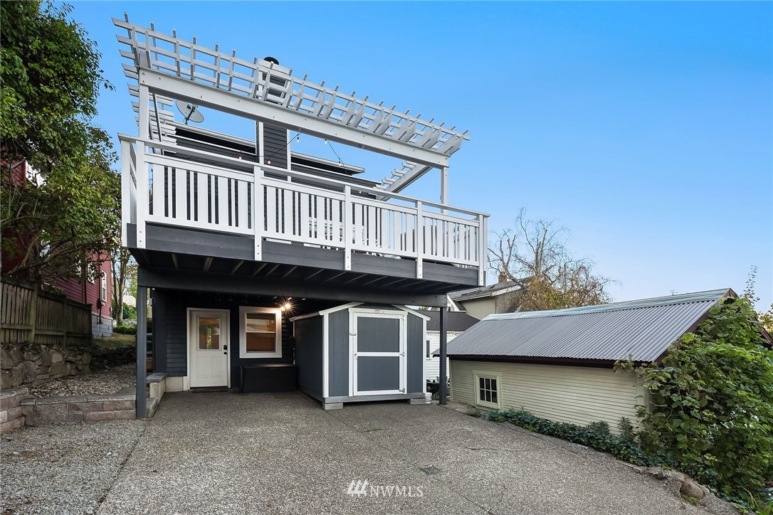 355 North 75th Street Seattle, WA 98103 - Photo 31 of 32 a view of a house with a balcony and deck