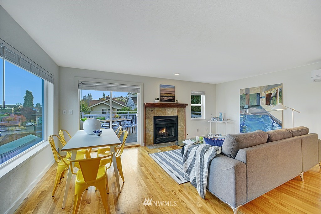 355 North 75th Street Seattle, WA 98103 - Photo 8 of 32 a living room with fireplace furniture and a fireplace
